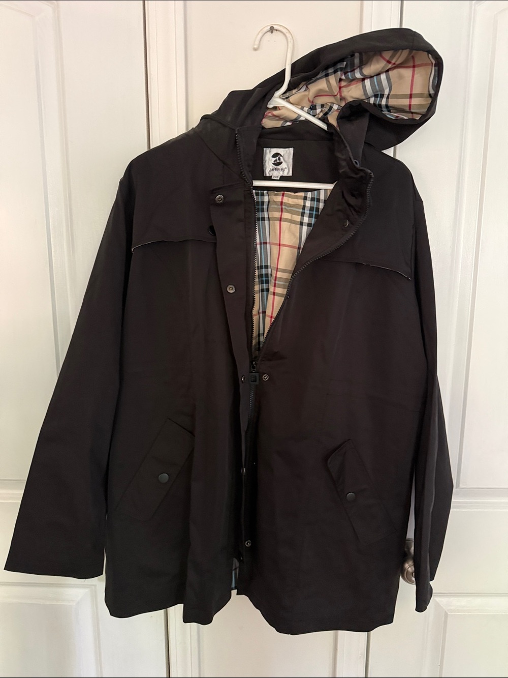 Woman’s Black Hooded Rain Coat with Plaid Lining